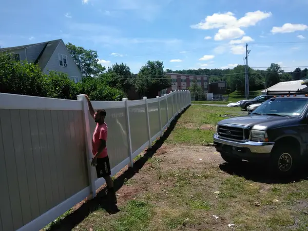 Long residential vinyl privacy fence